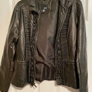 I really love this jacket it very comfortable and it is not tight anywhere.